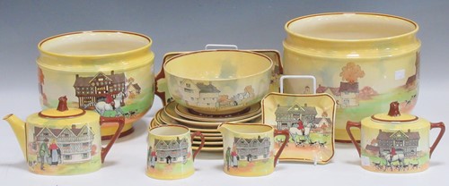 Lot 49 - A Royal Doulton yellow ground part tea service...