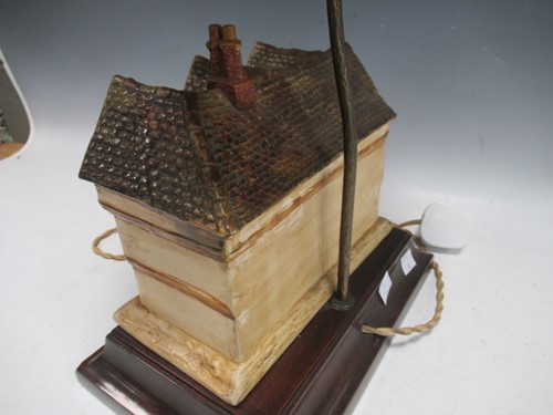 Lot 46 - A Cecil Aldin ceramic model of a country inn...