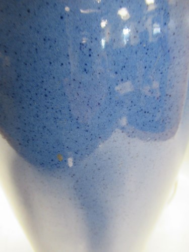 Lot 67 - A pair of Moorcroft powder blue ceramic vases...