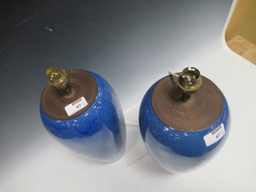 Lot 67 - A pair of Moorcroft powder blue ceramic vases...