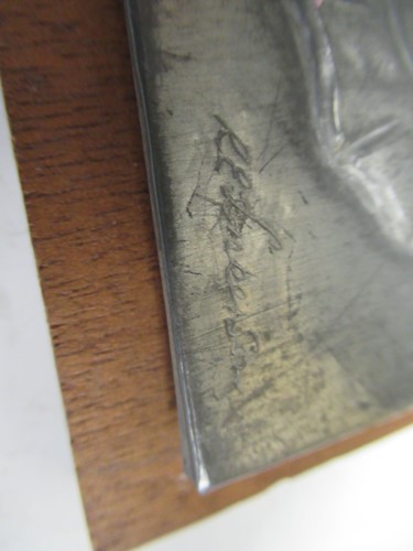 Lot 96 - An embossed metal sheet with seahorse relief...