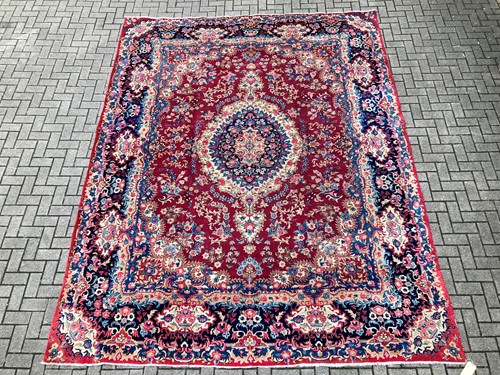 Lot 373 - A Kirman carpet, 381 x 299cm