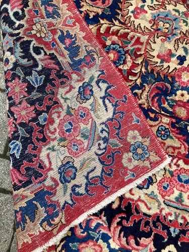 Lot 373 - A Kirman carpet, 381 x 299cm