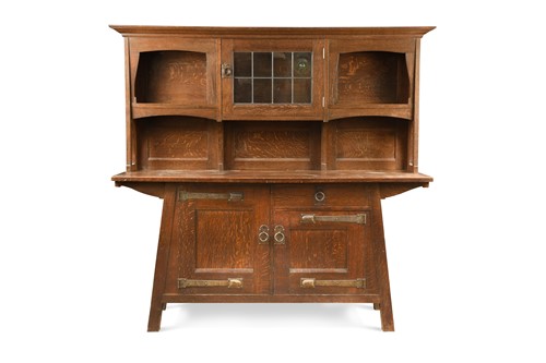 Lot 215 - Attributed to Leonard Wyburd for Liberty & Co., an Arts & Crafts oak dresser