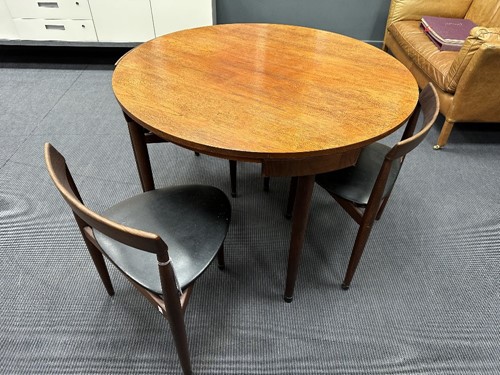 Lot 290 - Hans Olsen for Frem Rojle, a Danish teak dining table and four hideaway chairs, circa 1965