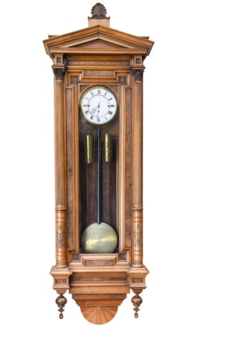 Lot 527 - An impressive Vienna figured walnut chiming wall clock