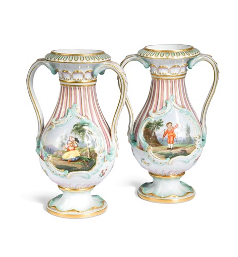 Lot 513 - A pair of Meissen porcelain two-handled 'kinder' vases, 19th century
