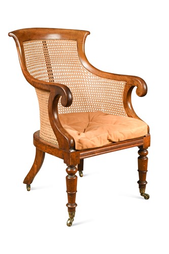 Lot 532 - A caned mahogany bergère library armchair, 19th century