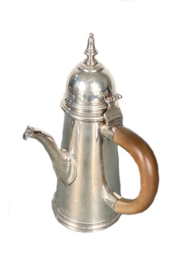 Lot 557 - A George V Britannia silver coffee pot