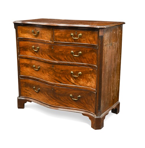 Lot 478 - A George III mahogany serpentine fronted chest of drawers