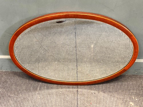 Lot 455 - An oval mahogany wall mirror, 55 x 81cm