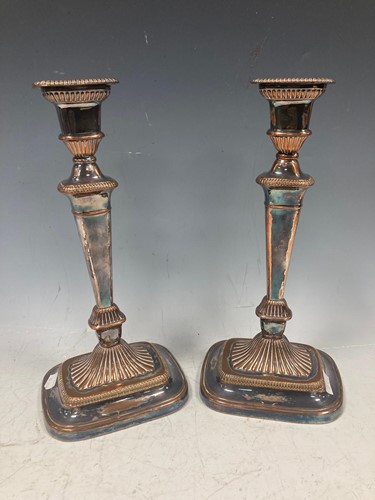 Lot 200 - A pair of plated candlesticks, 32cm high