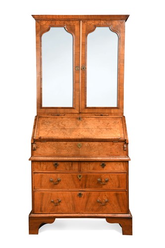 Lot 553 - A walnut bureau cabinet, early 18th century