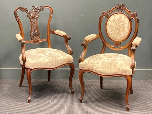 Lot 338 - Two Edwardian upright carved frame open armchairs