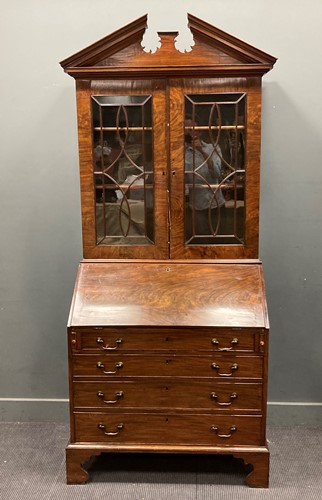 Lot 793 - A George III mahogany bureau bookcase with...
