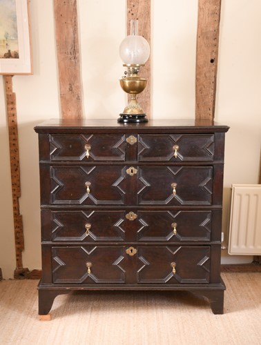 Lot 413 - A stained oak chest of drawers, 17th century