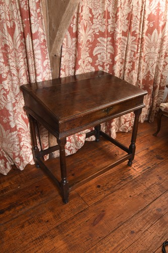 Lot 416 - An oak writing desk, 18th century
