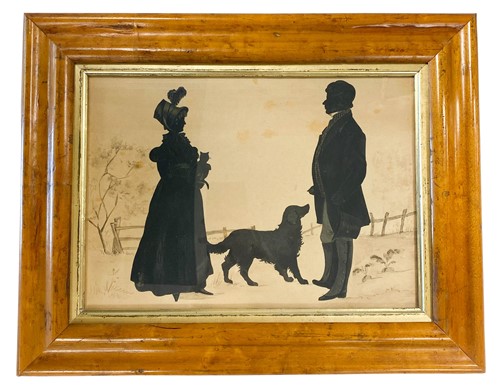 Lot 621 - A silhouette of a well-dressed couple with a cat and a dog, early 19th century