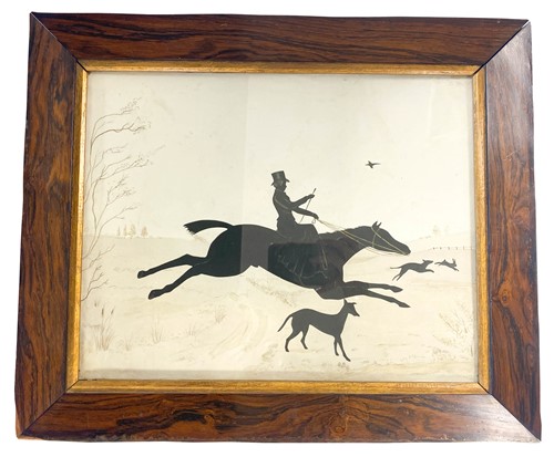Lot 623 - A silhouette of a rider and dogs pursuing a hare, 19th century
