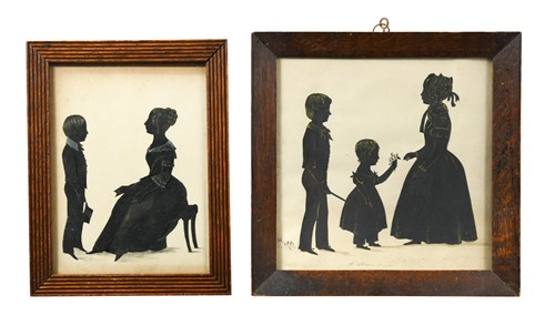 Lot 616 - Two early Victorian family group silhouette portraits