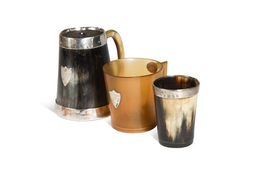 Lot 422 - A Scottish provincial silver mounted mug, a Scottish silver mounted mug and a silver mounted cup