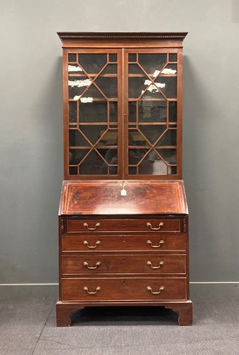 Lot 451 - An inlaid mahogany bureau bookcase, 19th...