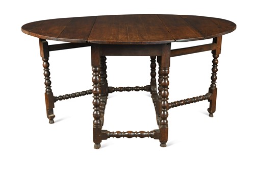 Lot 906 - A William & Mary oak gateleg table