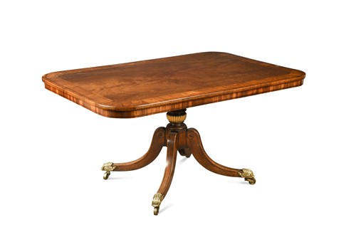 Lot 524 - A Regency brass inlaid breakfast table