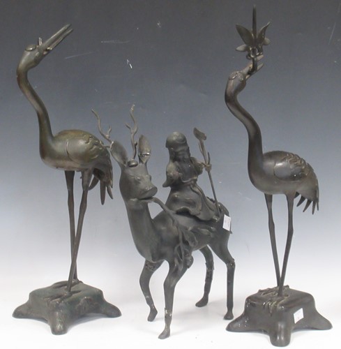 Lot 69 - A near pair of Chinese bronze Cranes, 19th...