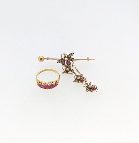 Lot 188 - A synthetic ruby ring, worn hallmark for 18ct...