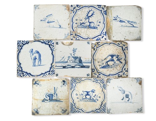 Lot 315 - A collection of twenty-two Delft blue and white tiles, 18th century