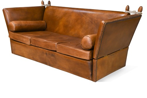 Lot 645 - A large three-seater Knole type leather sofa, modern
