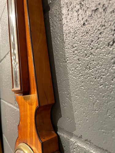 Lot 564 - A satinwood banjo barometer by Dixey, London, of narrow proportions, 19th century