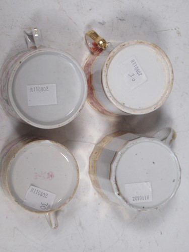 Lot 22 - Various small porcelain cups, coffee cans,...