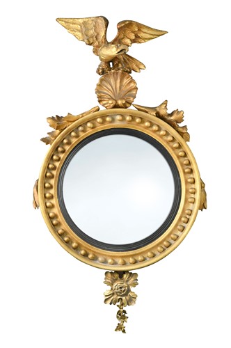 Lot 491 - A Regency giltwood convex wall mirror