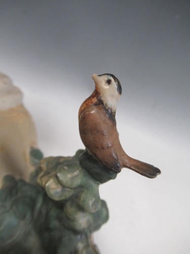 Lot 5 - A Lladro model of a young girl with a water...