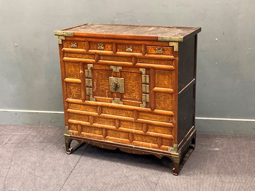 Lot 434 - A Korean figured elm chest of drawers, on...
