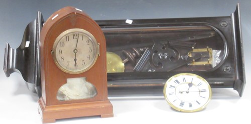 Lot 110 - An ebonised case Vienna style wall clock (in...