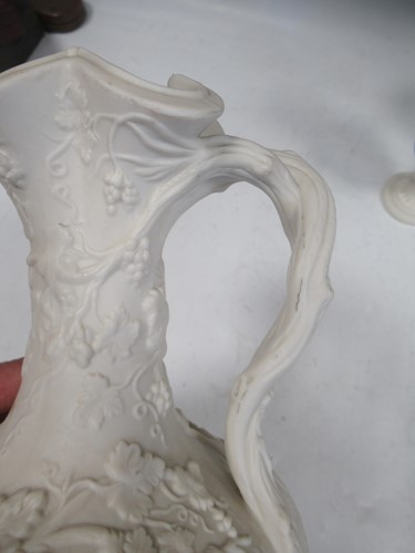 Lot 20 - Four Copeland parian jugs, moulded and applied...