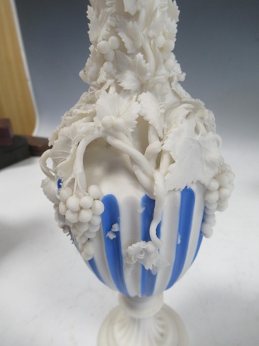 Lot 20 - Four Copeland parian jugs, moulded and applied...