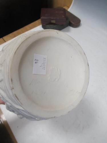 Lot 20 - Four Copeland parian jugs, moulded and applied...