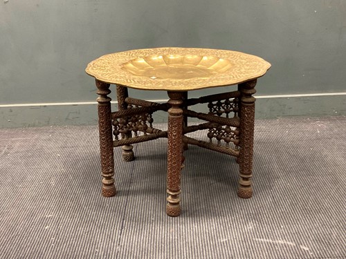 Lot 489 - An Indian recessed-brass top occasional table...