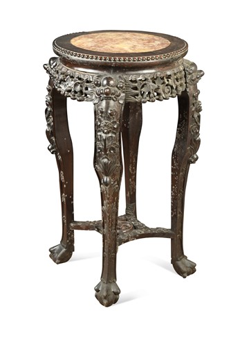 Lot 461 - An oriental carved and pierced hardwood stand with marble top, circa 1900