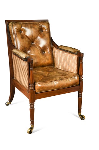 Lot 508 - A Regency mahogany bergère library armchair