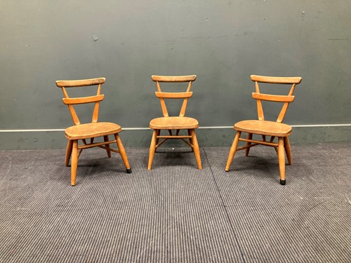 Lot 493 - Three Ercol child's chairs 52 x 29 x 28cm