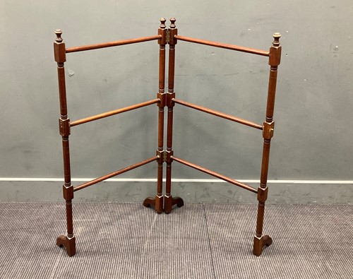 Lot 505 - A mahogany towel rail 106 x 116 x 38cm