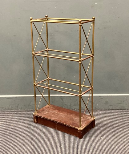 Lot 500 - A metal bookstand on a wooden plinth base 91 x...