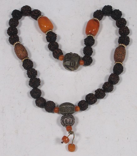 Lot 196A - A string of Chinese beads including some amber,...