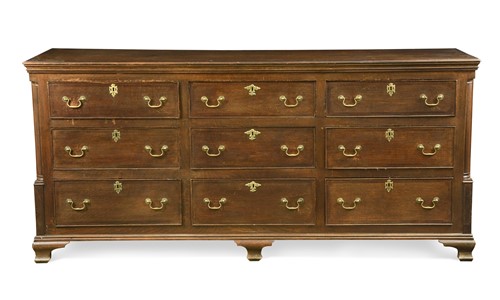Lot 321 - A George III oak and mahogany dresser base