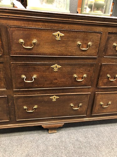 Lot 321 - A George III oak and mahogany dresser base